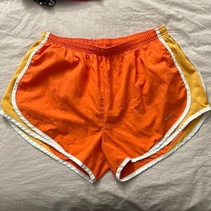 Nike bright orange tempo shorts